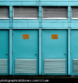 Photo of a building painted cyan.