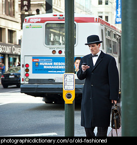 Photo of a man wearing an old fashioned outfit