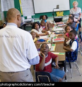 Photo of a man teaching a class.