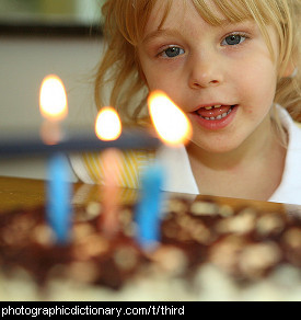 Photo of a little girl's third birthday