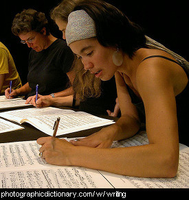 Photo of people writing music