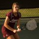 Photo of a woman playing tennis.